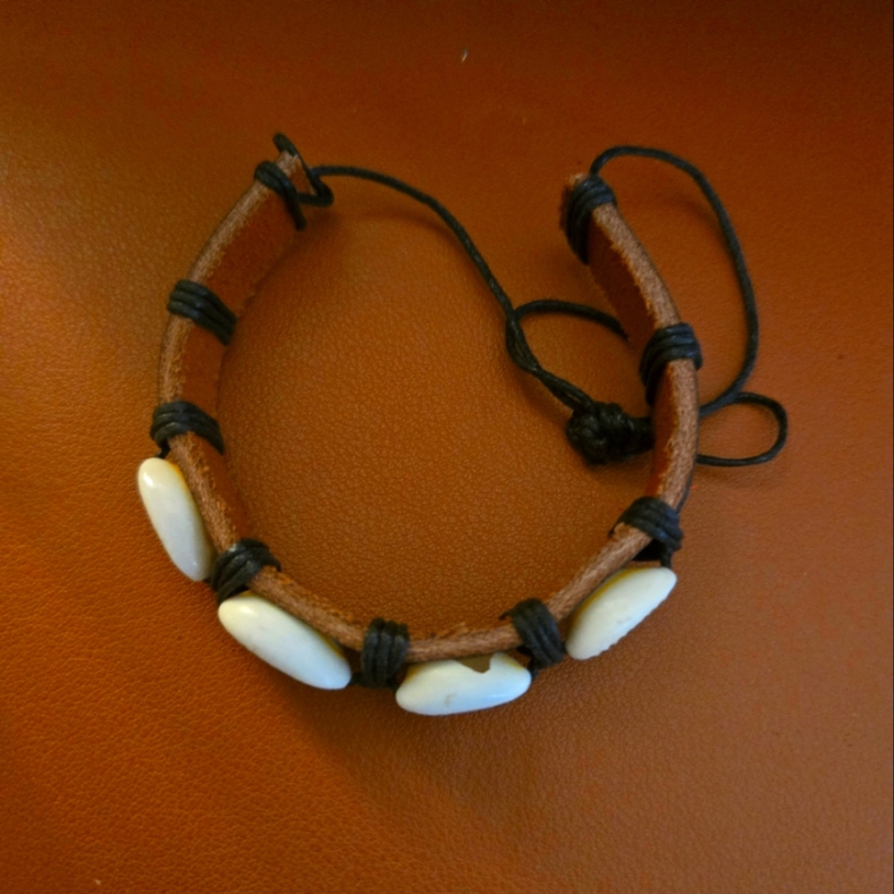 Cowrie shell bracelet, adjustable  leather strap